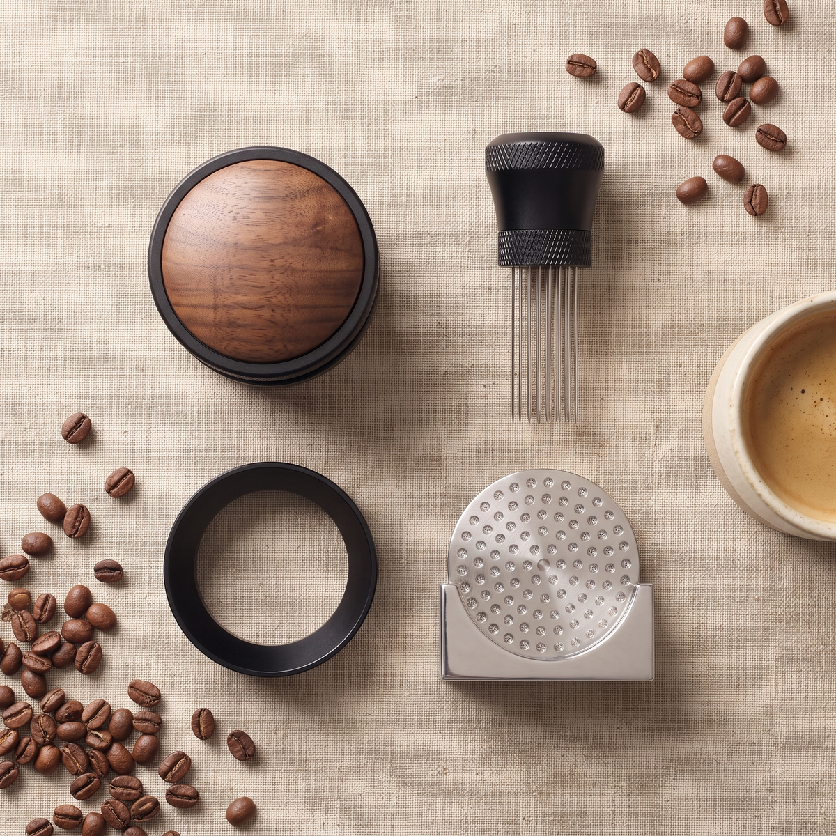 CremaKit Prep Kit flat lay: palm tamper, WDT tool, dosing ring and puck screen